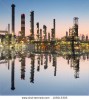 stock-photo-oil-and-gas-refinery-with-reflection-in-water-petrochemical-factory-105015305